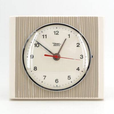 Cette horloge est neuve… pourtant elle date des années 60 ! horloge mural ceramique vintage relief ligne marron clair